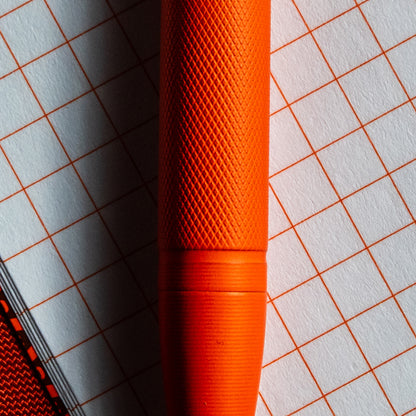 Carryology Blaze Orange Essentials Slim Bolt Action Pen